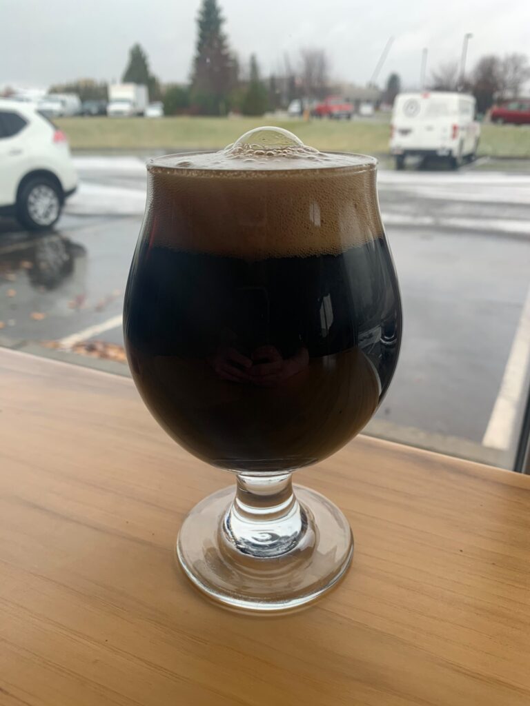 Barrel aged imperial stout cask on draft! Aged with whiskey coffee and primed wi